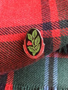 Clan Chattan Association pin on MacPhail tartan